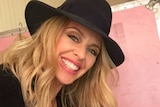 Australian singer Kylie Minogue takes a selfie.