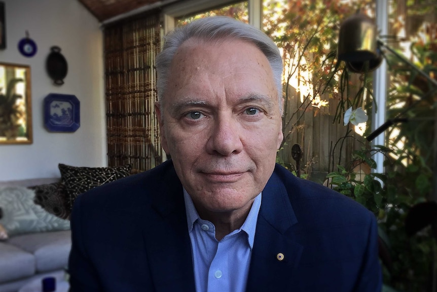 Photo of Bill Bowtell, who was Chief of Staff for the federal Health Minister Neal Blewett in 1984 sitting in his backyard.