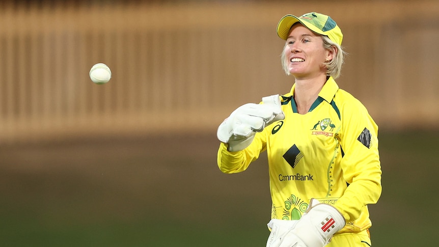 Australia wicketkeeper Beth Mooney throws a cricket ball during a Twenty20 against Pakistan.