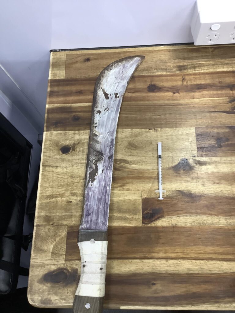 A machete on a table 