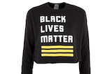 A Black Lives Matter sweatshirt featuring the yellow three-stripe design.