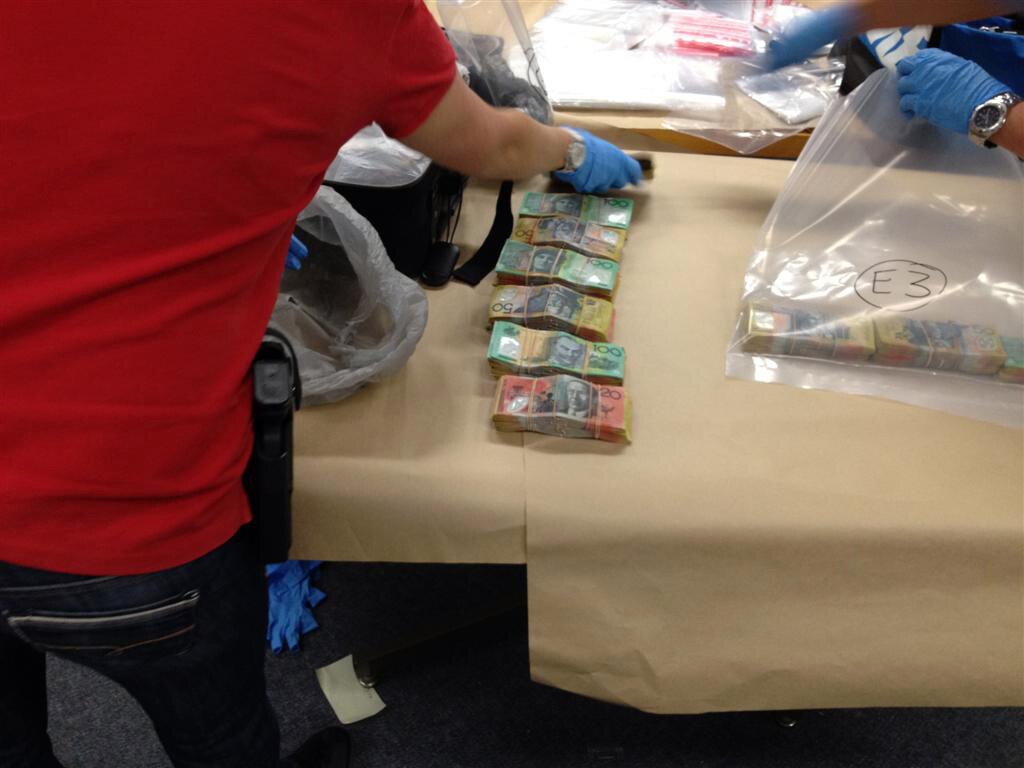 Police seize millions in cash in Brisbane shed - ABC News