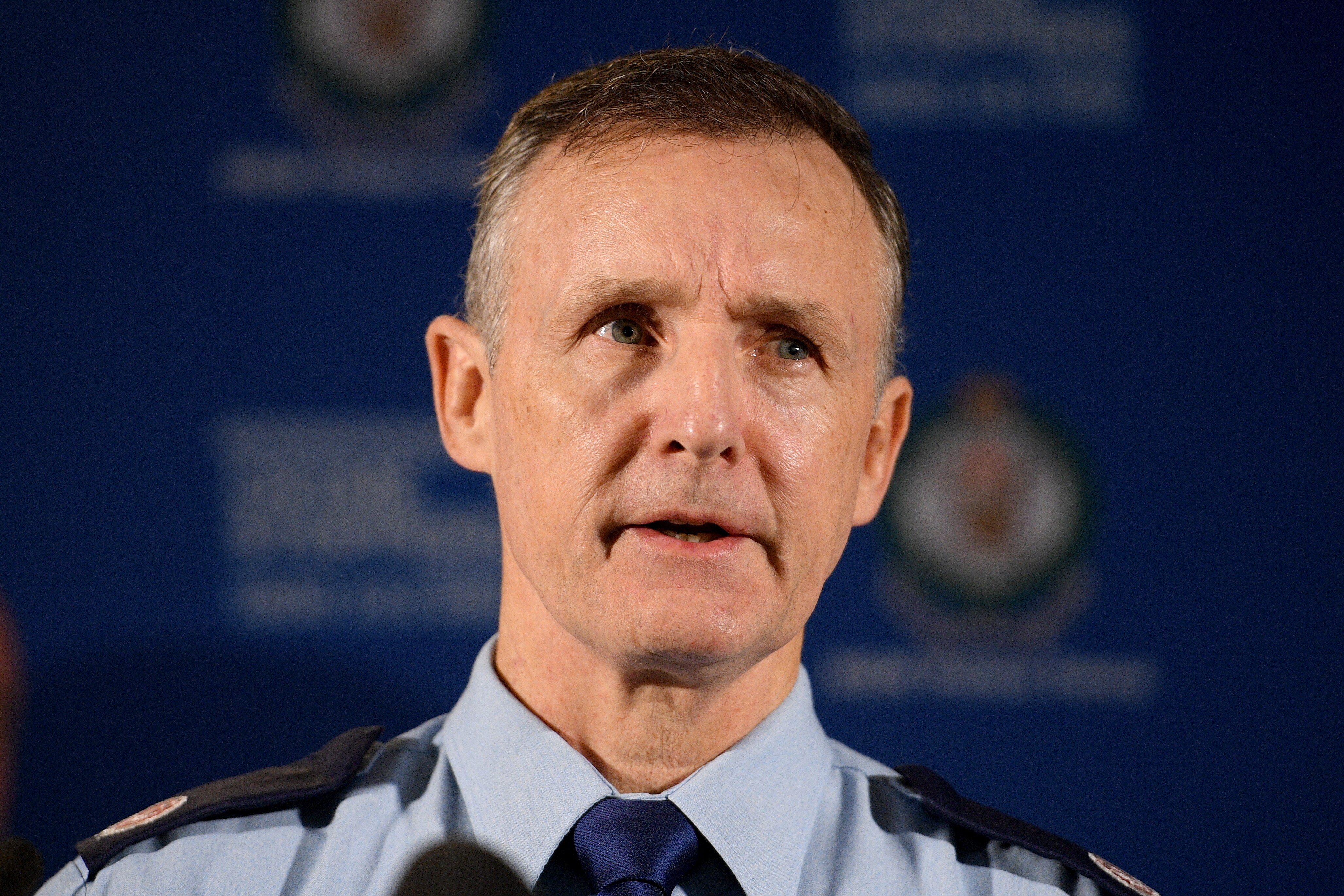 a police officer speaking to the media