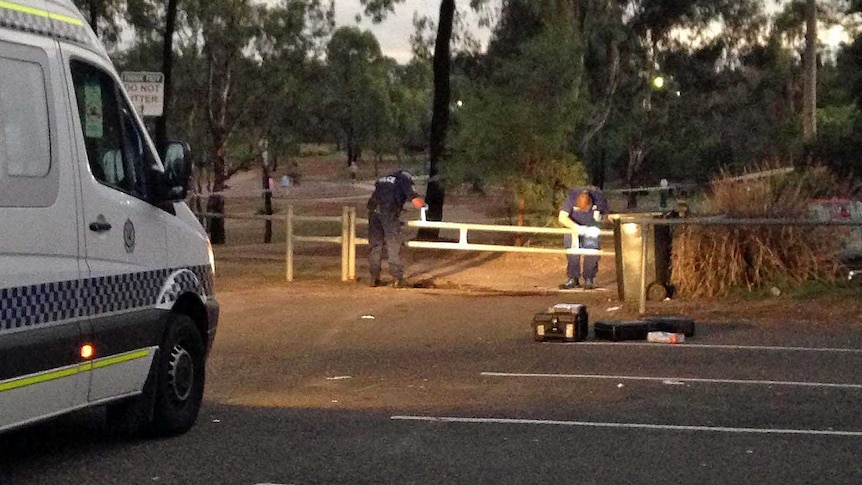 Police examine crime scene at Woodcroft