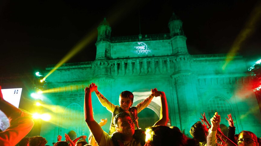 People celebrates New Year's eve in front of the iconic Gateway of India.