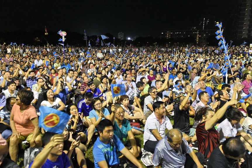 Supporters gather to listen opposition Worker's Party (WP) candidates