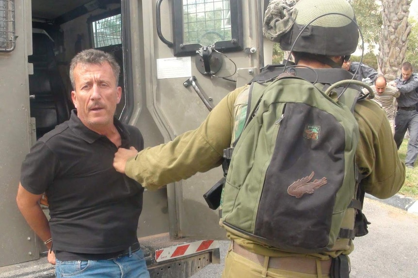 Ahed Tamimi's father Bassem is arrested.