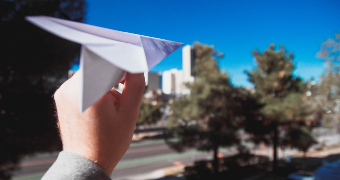 Throwing a paper aeroplane
