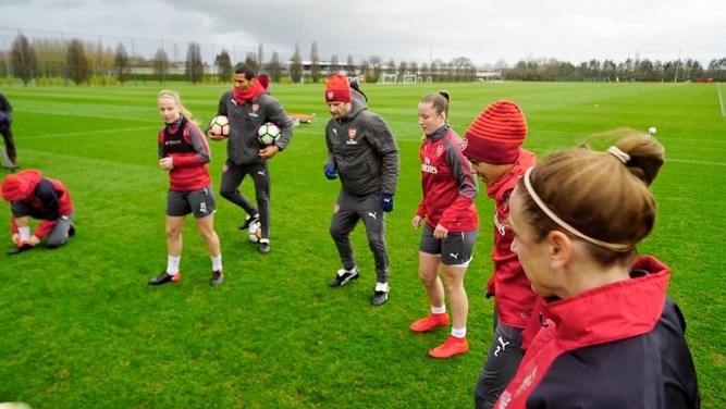 Joe Montemurro trains Arsenal players in the UK.