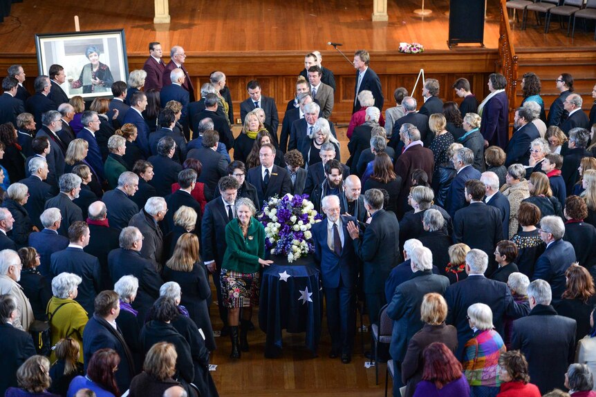 Joan Kirner's coffin is led out of Williamstown Town Hall at the conclusion of her state funeral on June 5, 2015.