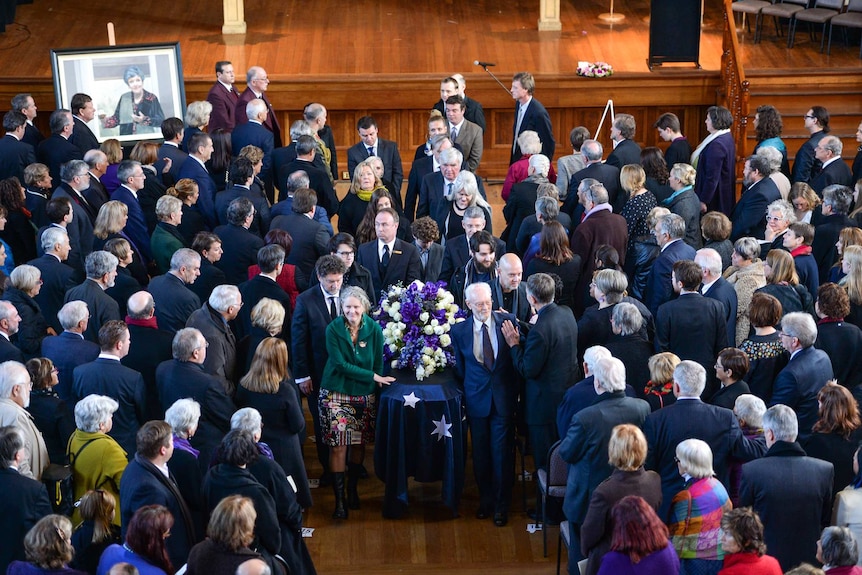 Joan Kirner's coffin is led out of Williamstown Town Hall at the conclusion of her state funeral on June 5, 2015.