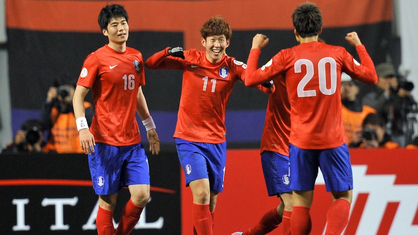 Korea celebrates against Qatar