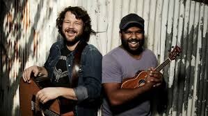 Thomas Busby and Jeremy Marou standing next to each other
