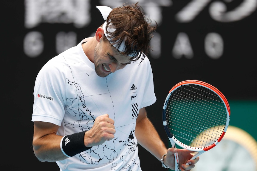 Dominic Thiem pumps his right fist during his win over Mikhail Kukushkin at the Australian Open.