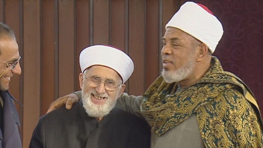The new Mufti (L) is described as a moderate.