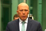 Peter Dutton speaks to journalists at a press conference