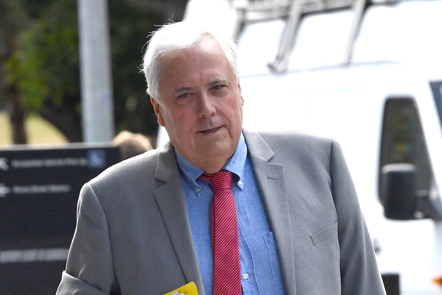 Clive Palmer arrives at the Supreme Court in Brisbane