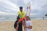 Alyssa Lock gets chaired up the beach