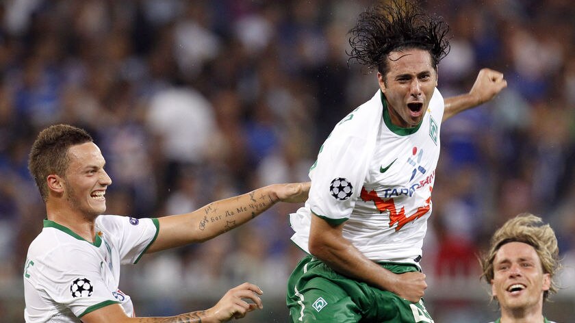 Former Chelsea striker Claudio Pizarro helps send Bremen into the group stages.