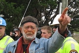 Aboriginal activist Jim Everett is arrested at the Brighton bypass construction site.