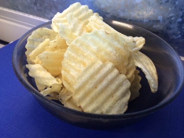 A bowl of potato chips