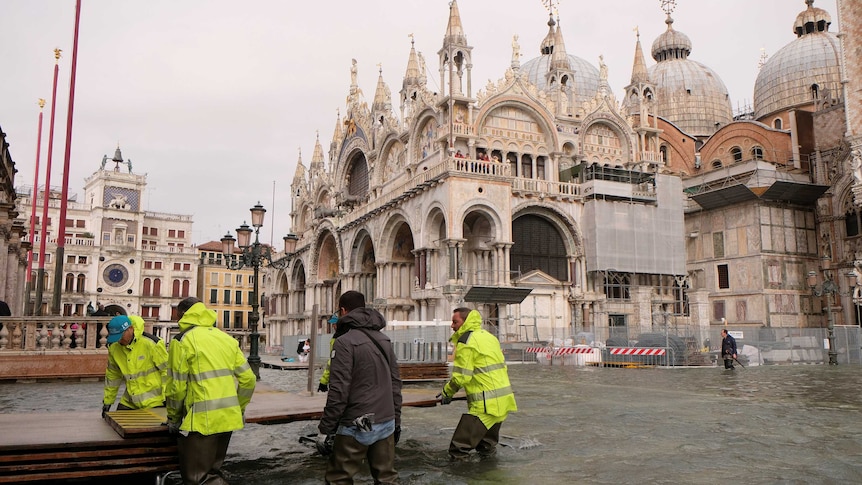 Venice's famous Saint Mark's Square was flooded by the high tide. (Pic: Reuters/Manuel Silvestri)