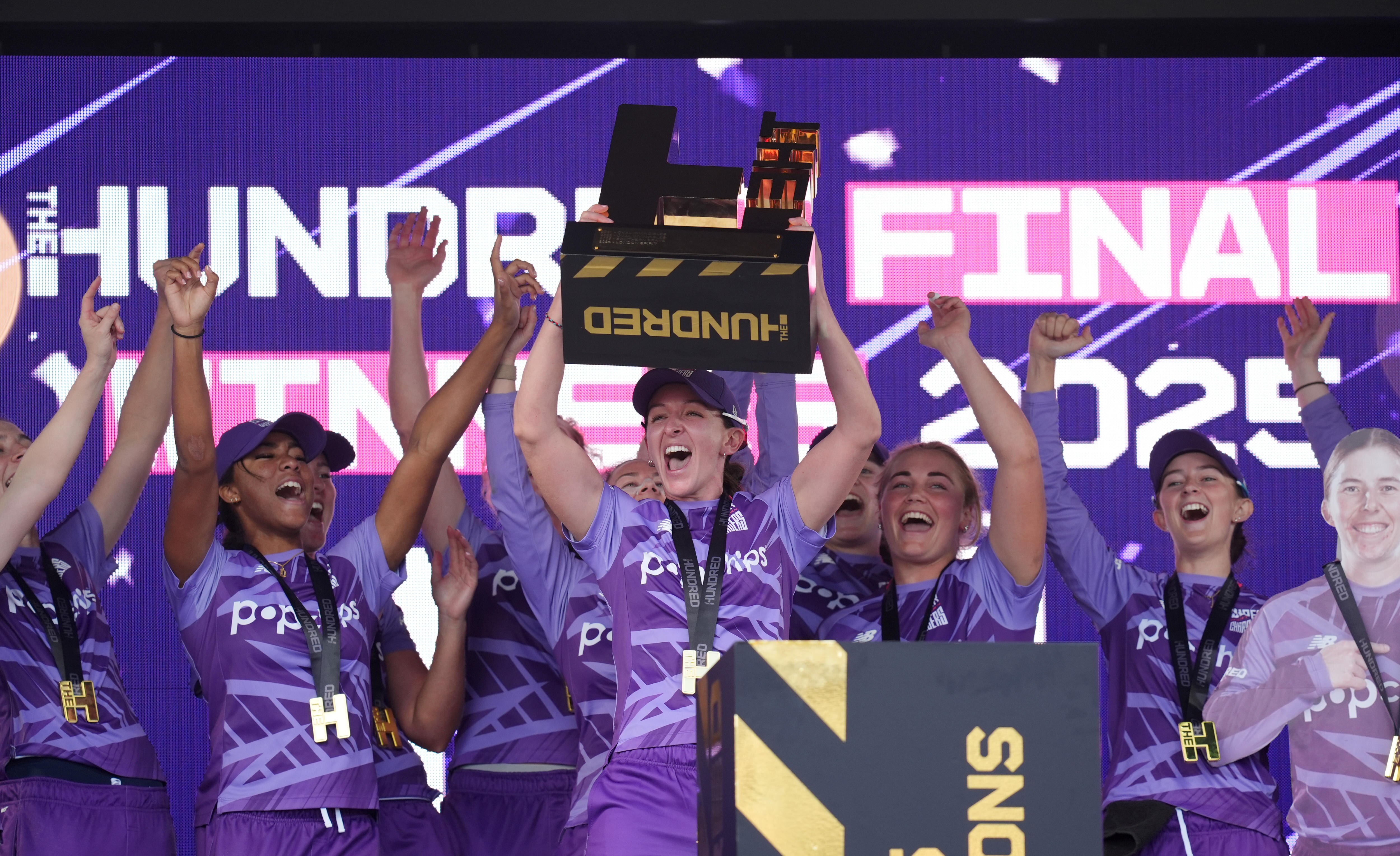 Northern Superchargers players celebrate during trophy lift