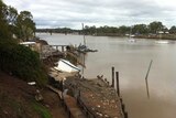 Part of the Midtown Marina building fell into the Burnett River in Bundaberg in southern Qld on February 19, 2013