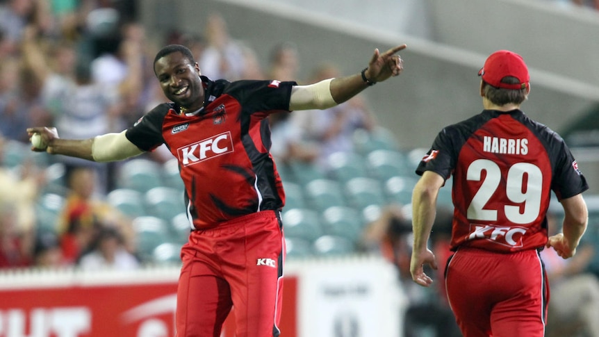 Kieron Pollard celebrates a grab as the Redbacks cruise to victory.