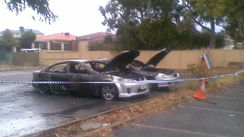 Police cars firebombed at Warwick Police Station.