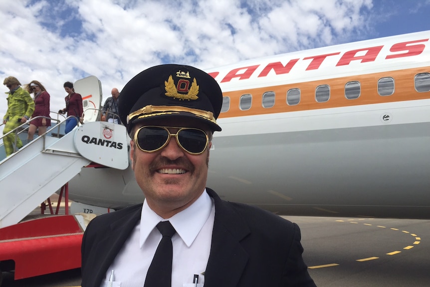 A charity flight operated by Qantas' iconic "Retro Roo" plane