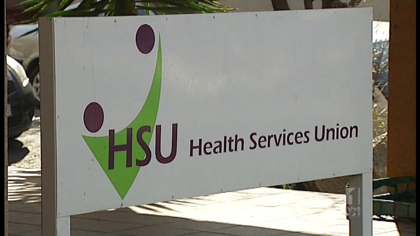 A Health Services Union sign.