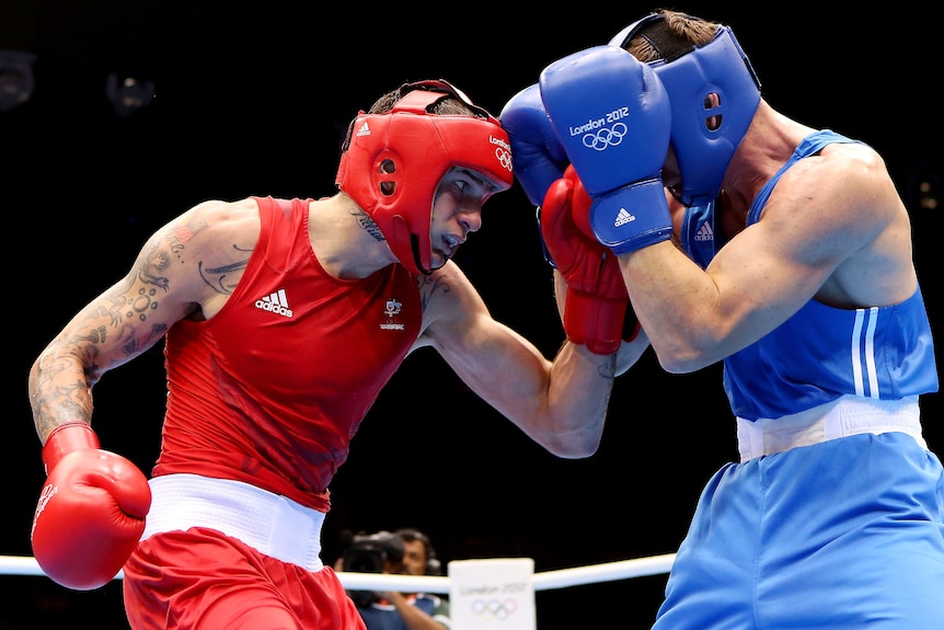Damien Hooper lands a punch in his bout against Egor Mekhontcev of Russia