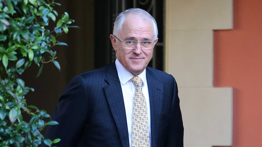 Malcolm Turnbull leaves his house