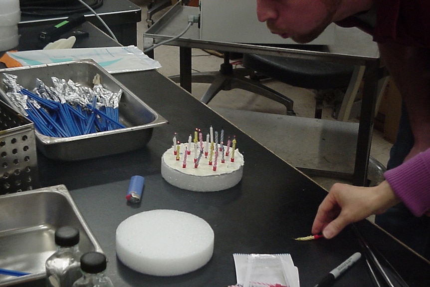 cake experiment blowing out candles