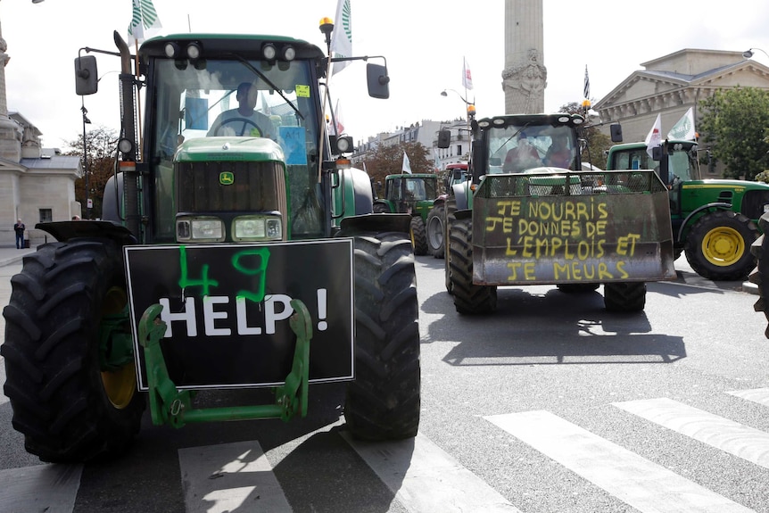 French farmers drive their tractors