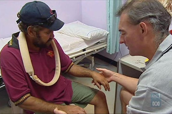 Doctor treating an Indigenous patient at a remote Northern Territory health clinic