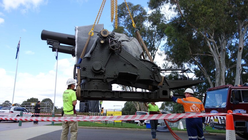 A British 9.2 inch howitzer being unloaded by crane in preparation for the war memorial's open day.
