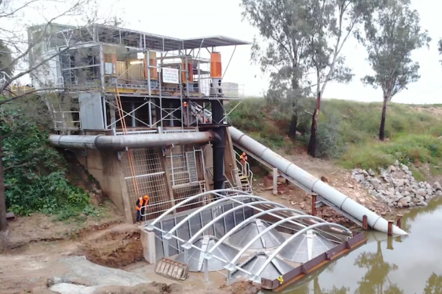 A water pump with fish screens on the river 