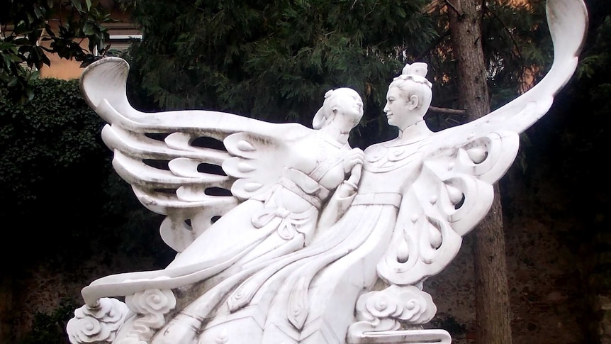 Marble statue of the Butterfly Lovers near the Tombe di Giuletta in Verona, Italy