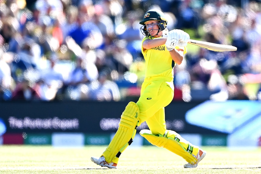 Australia batter Alyssa Healy completes her swing of the bat in the women's ODI World Cup final against England.