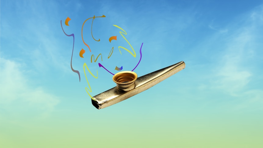 A gold kazoo floating in a blue sky.