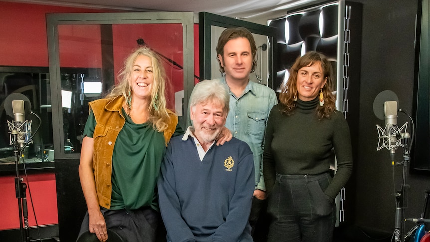 John Schumann with The Waifs band members Donna Simpson, Josh Cunningham and Vikki Thom stand together at the recording studio.