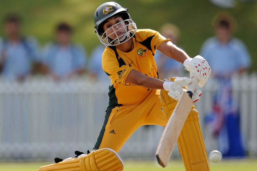 An Australian cricketer plays a batting stroke to the off side against West Indies in 2009 Women's Cricket World Cup.