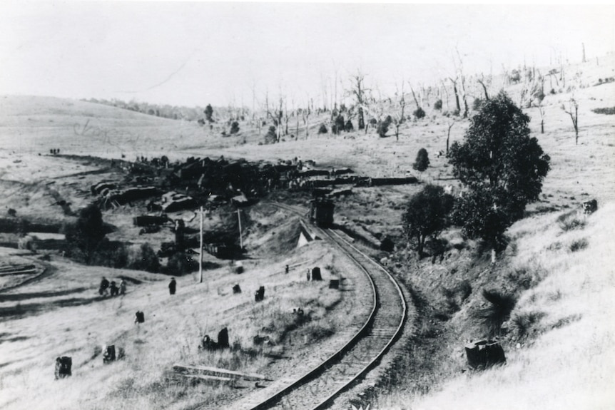 A black and white photo showing black earth where the train disaster occurred