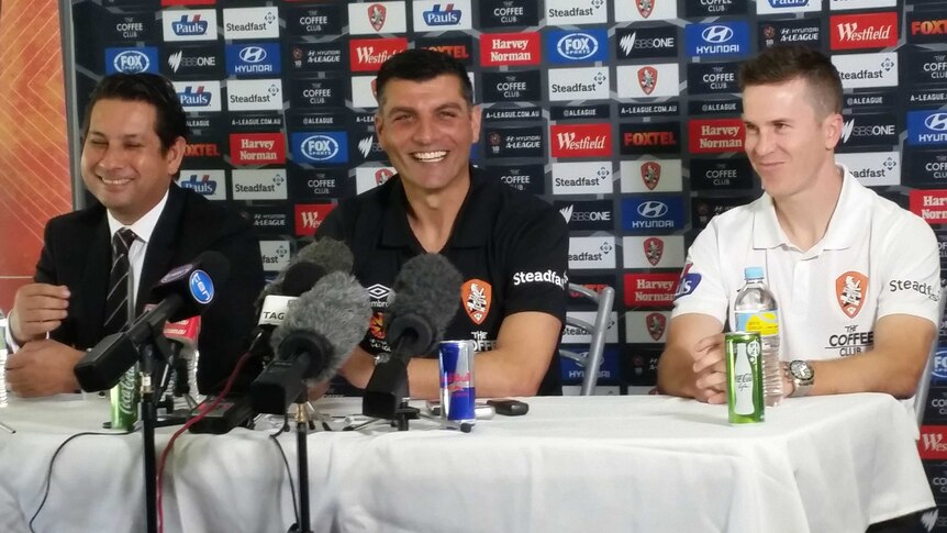 All smiles ... John Aloisi speaks to the media about his appointment as Brisbane Roar coach