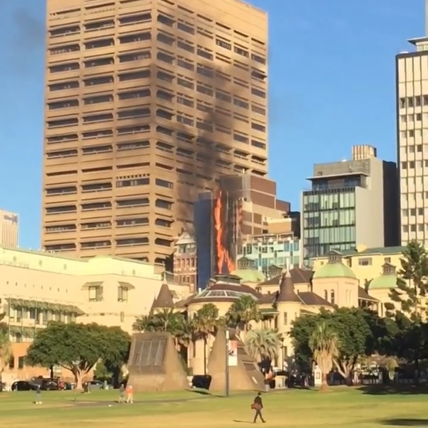 Large flames come from a construction site in Sydney's CBD.