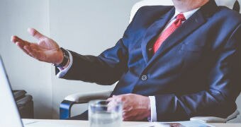 Manager with red tie