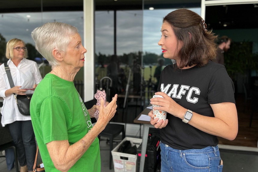 Labor federal MP for Griffith Terri Butler (right), talks to a voter.