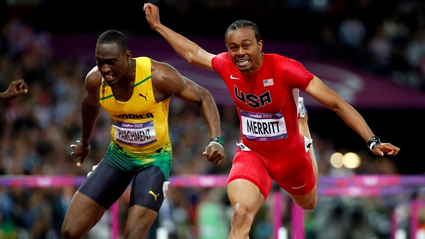 Aries Merritt (R) wins gold ahead of Hansle Parchment (bronze) in the men's 110m hurdles.